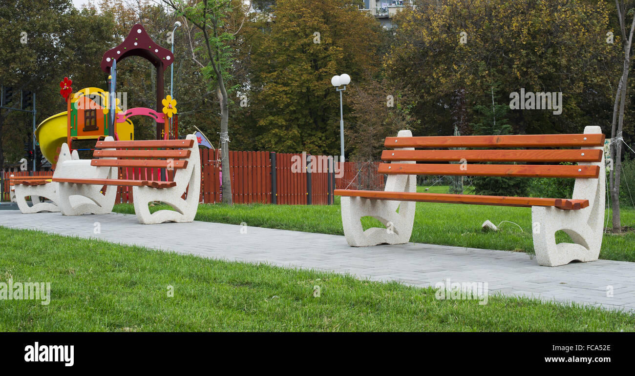 Wooden benches in a park Stock Photo - Alamy