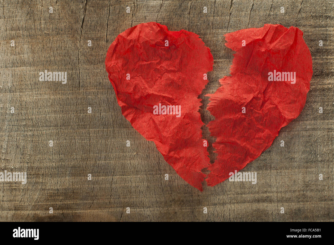 Heartbreak made ΓÇïΓÇïof curled red paper Stock Photo