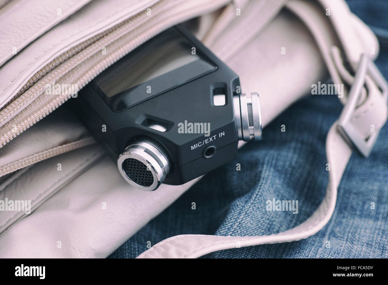 Voice recorder (audio recorder) in a bag. Close up. Stock Photo