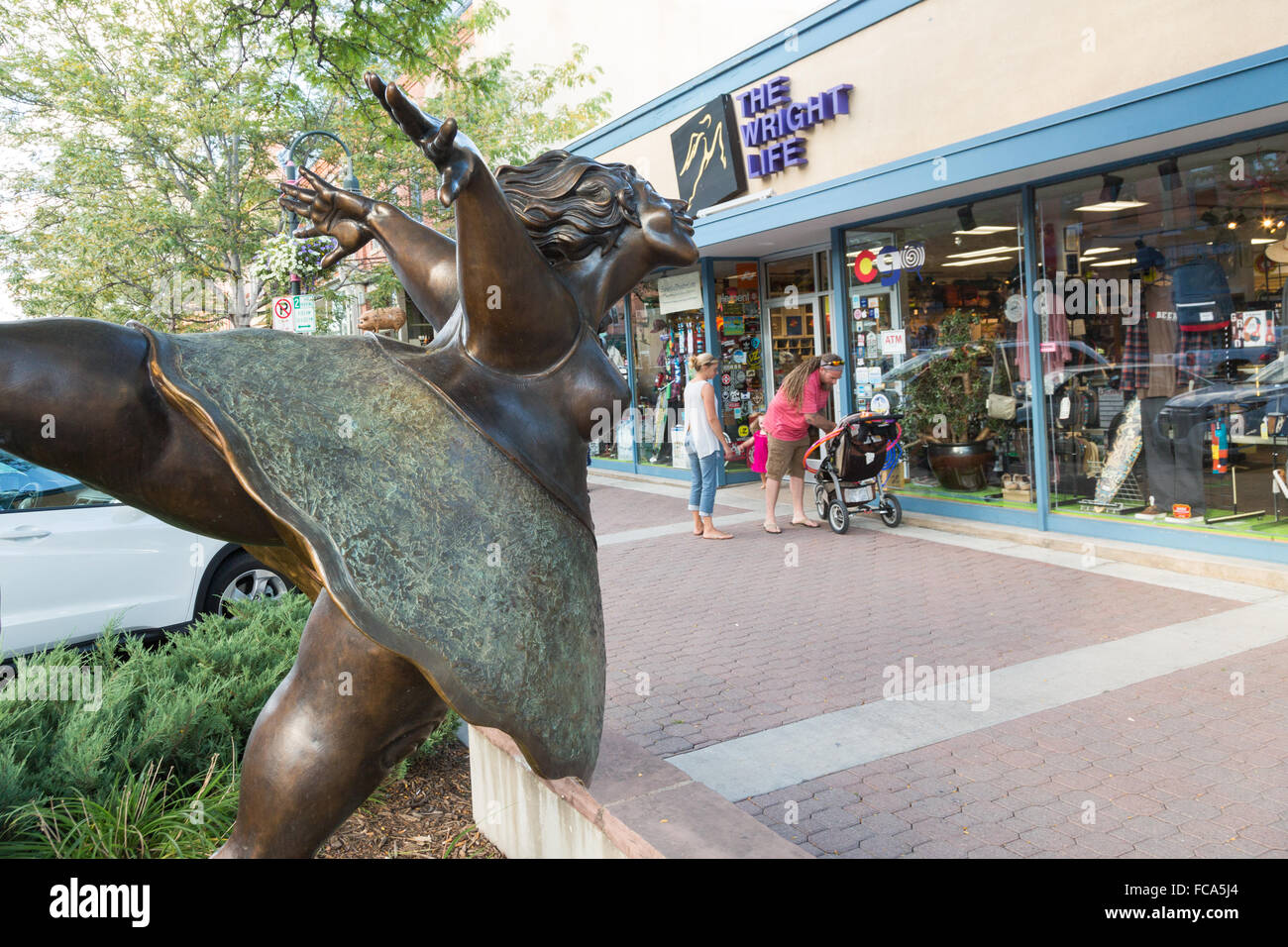 Free to Dance sculpture by artist James Lynxwiler in the Old Town historic shopping and restaurant district in Fort Collins, Colorado. Stock Photo