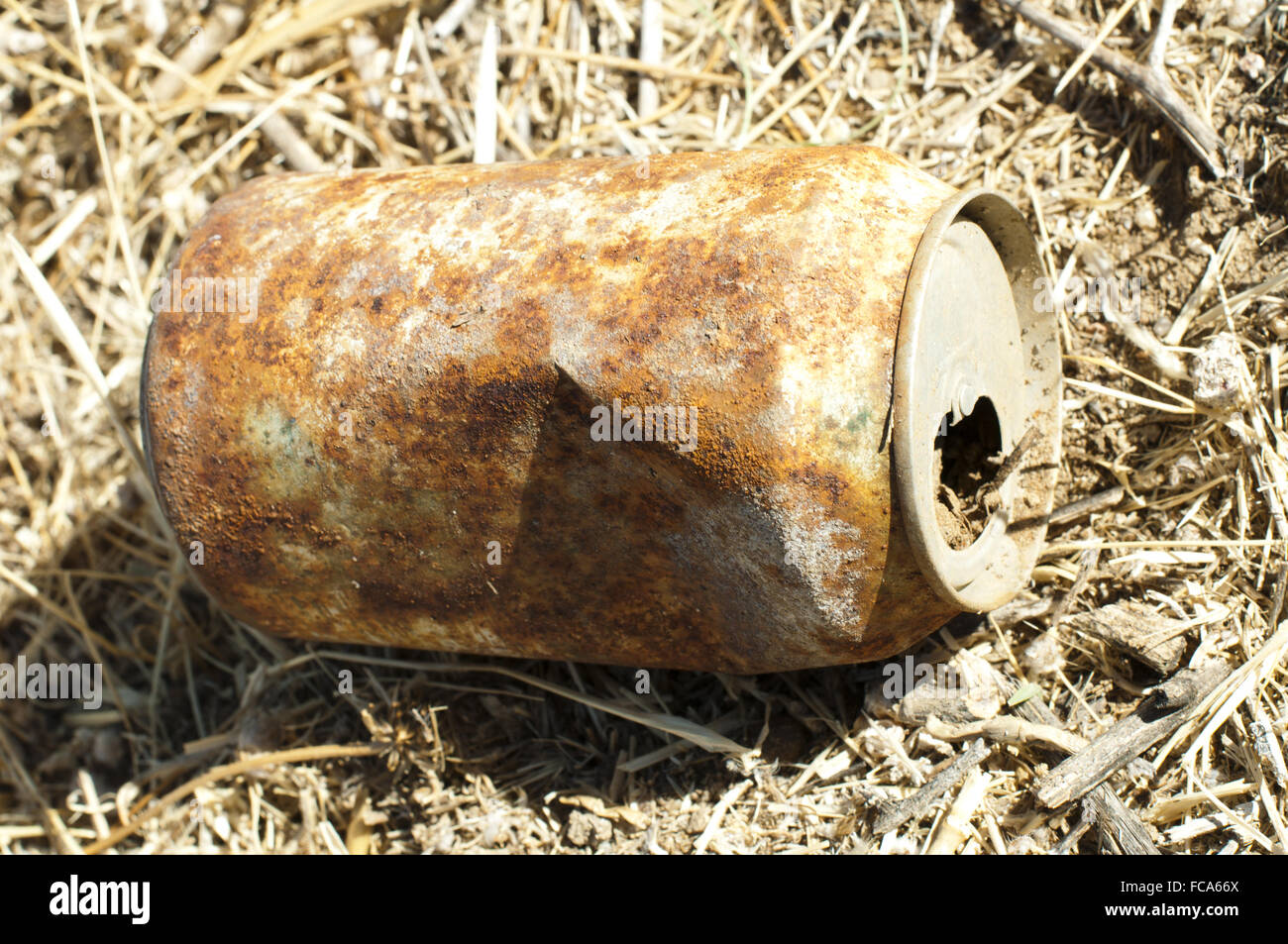 Old rusty can of soft drink Stock Photo