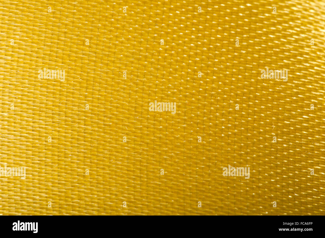 Yellow satin background Stock Photo - Alamy