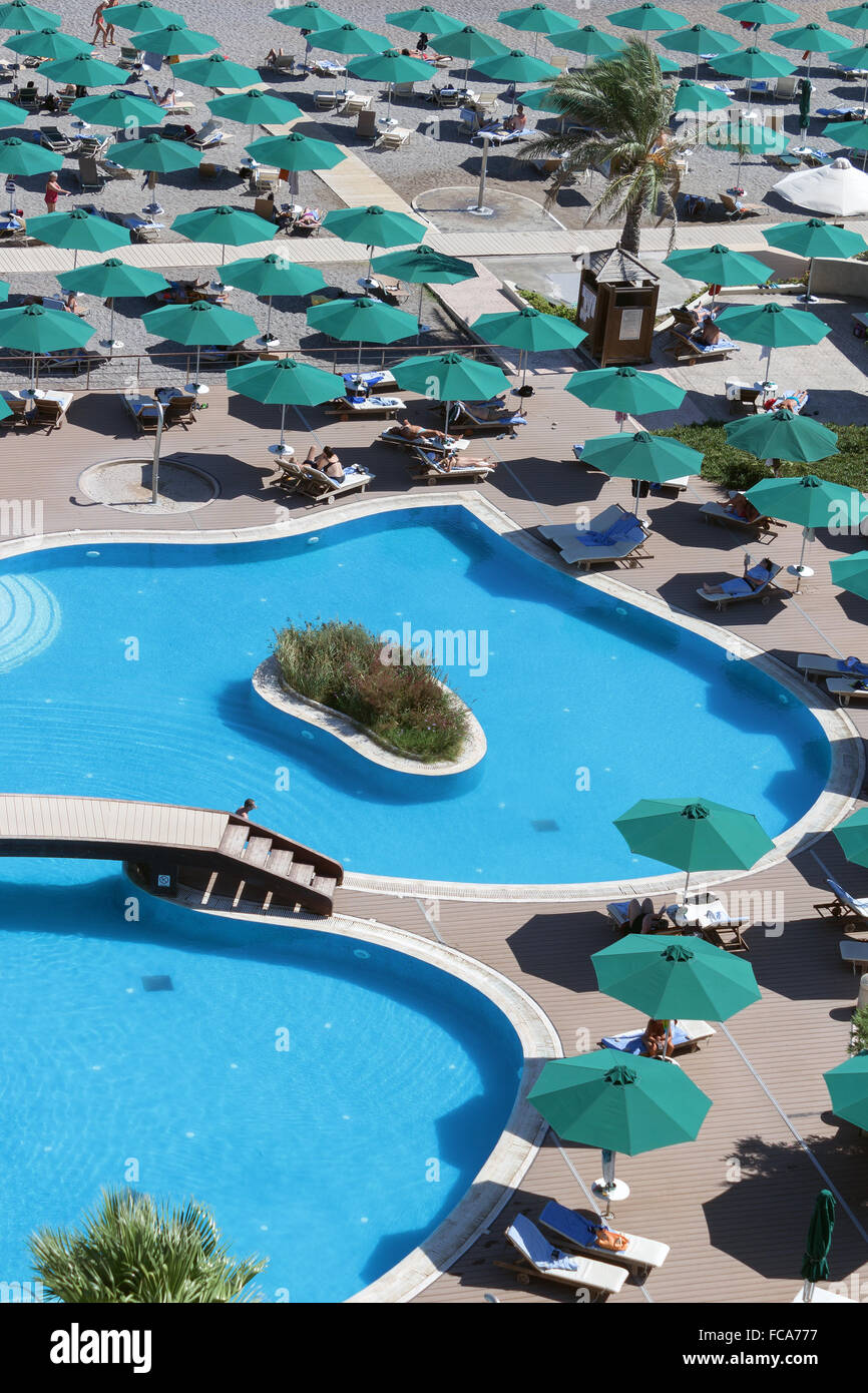 Pool area and beach umbrellas Stock Photo Alamy