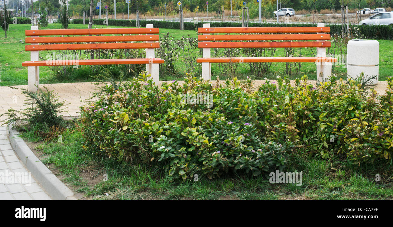 Wooden benches in a park Stock Photo - Alamy