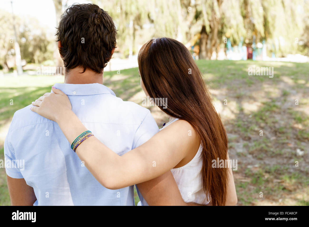 Young happy couple in the park in the summer Stock Photo - Alamy