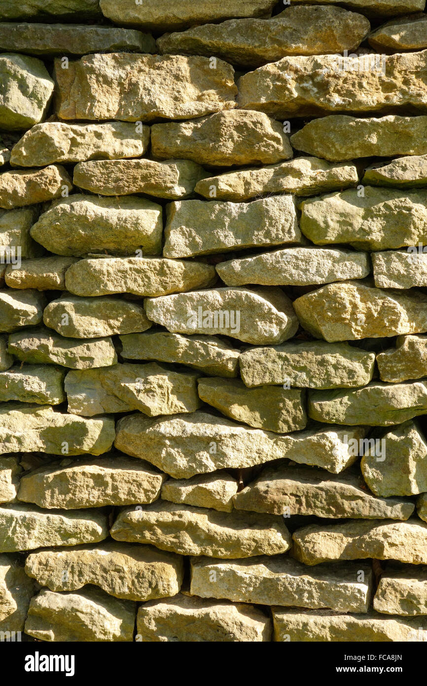 England, Oxfordshire, Great Tew, Cotswold dry stone wall. Stock Photo