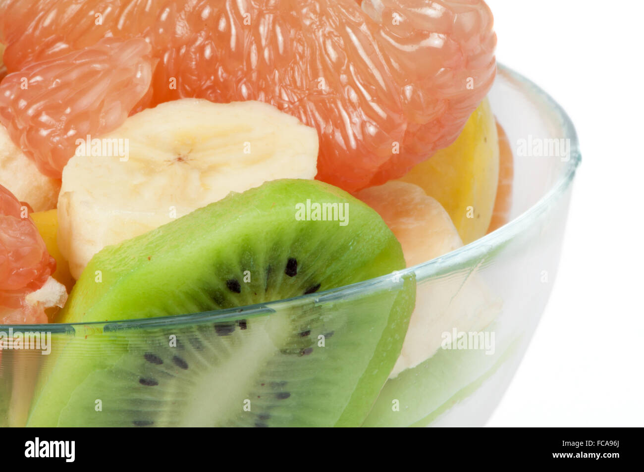 Fruit salad with citrus in a glass bowl Stock Photo - Alamy