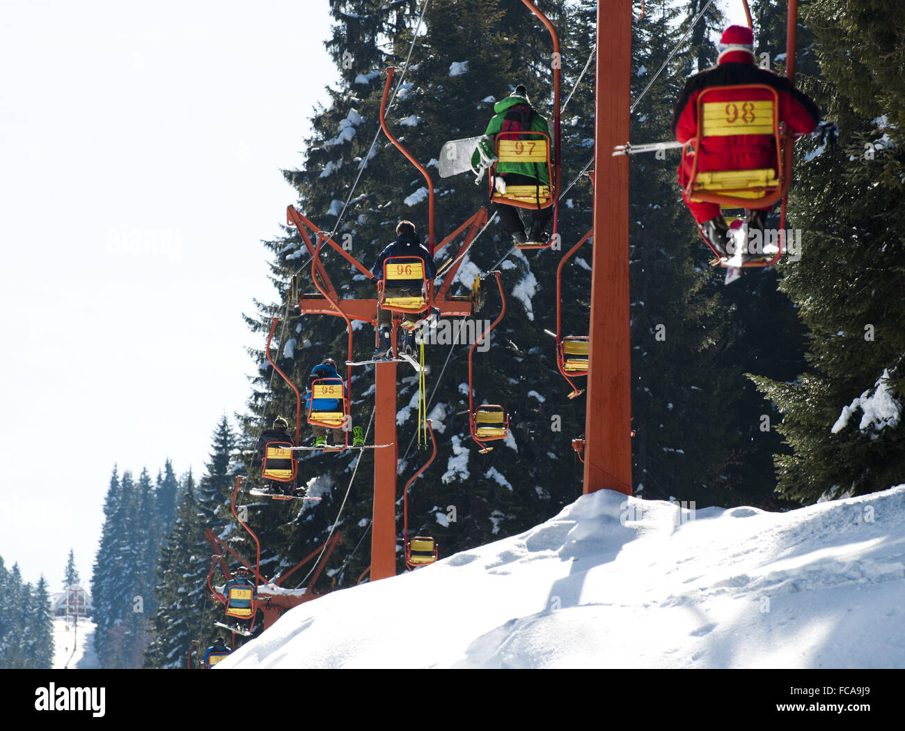 Ski lift and skiers Stock Photo - Alamy