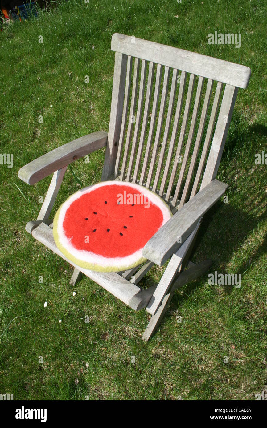 Garden Chair With Cantaloupe Cushion Stock Photo Alamy