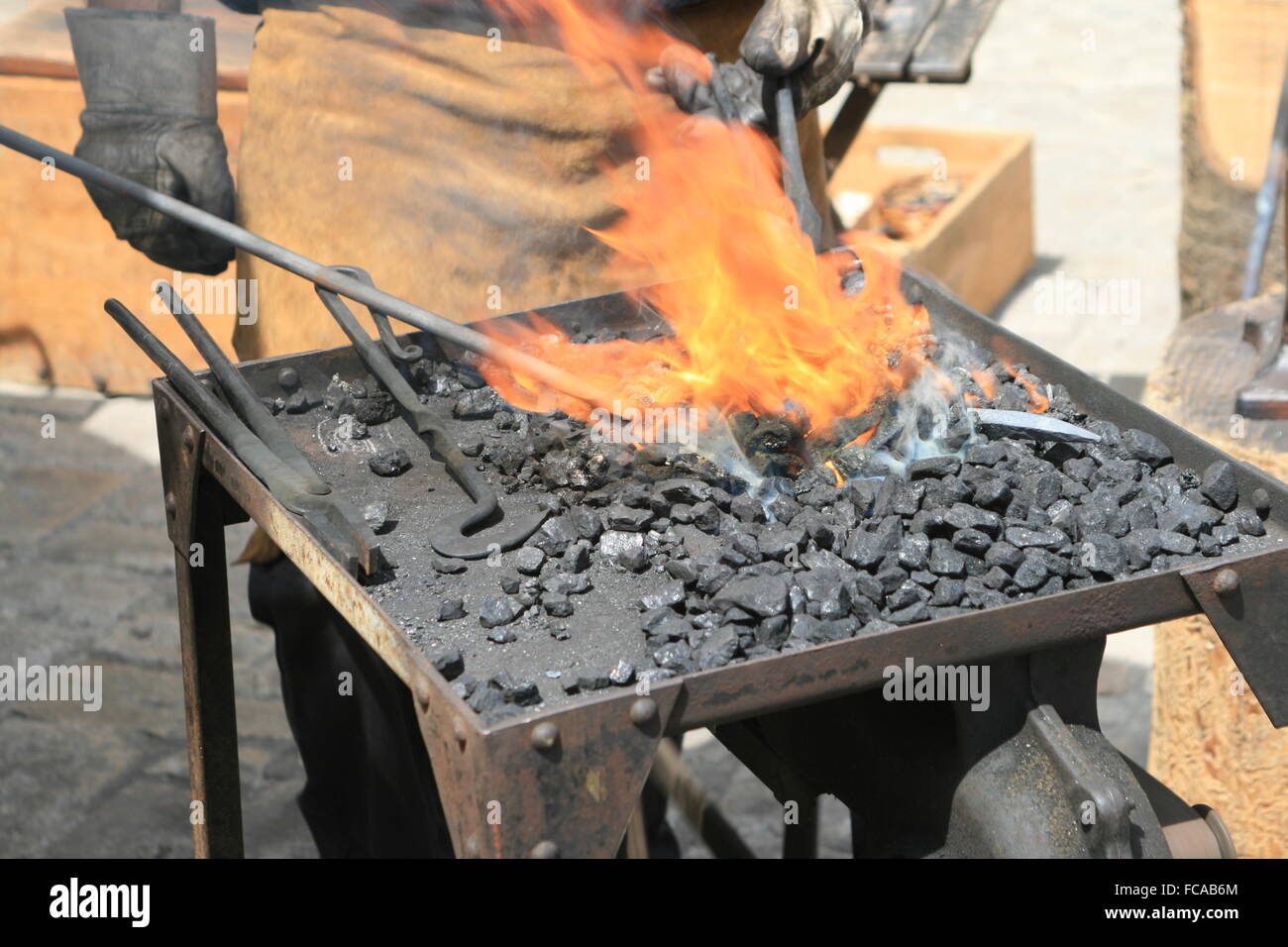 Blacksmith at the forge Stock Photo