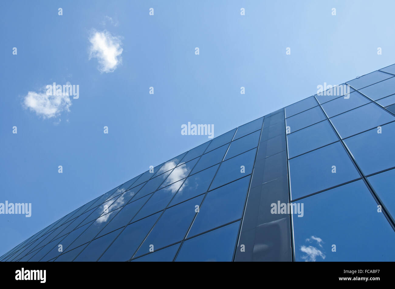 Office building on a blue sky Stock Photo - Alamy
