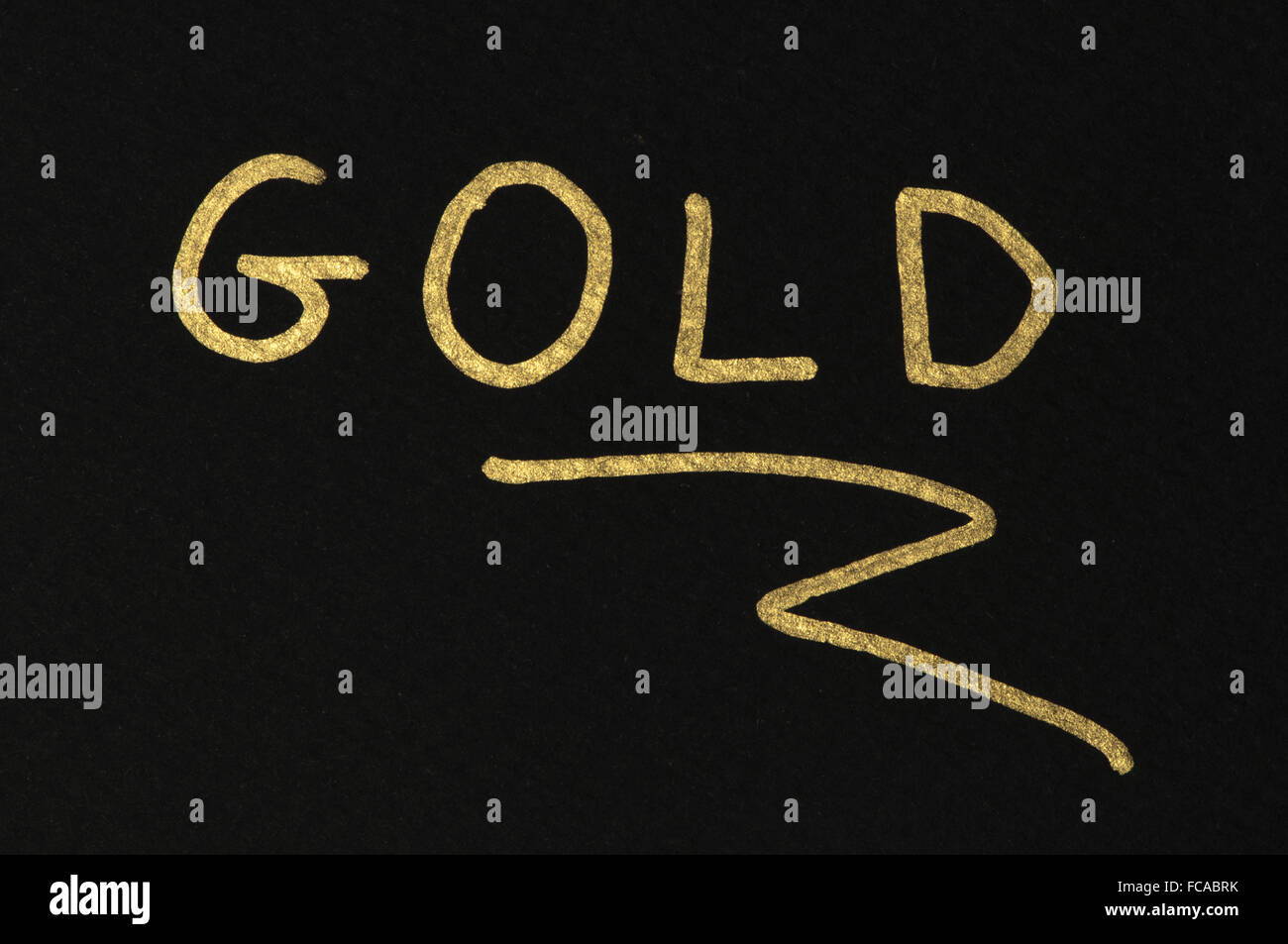 Gold conception text Stock Photo - Alamy