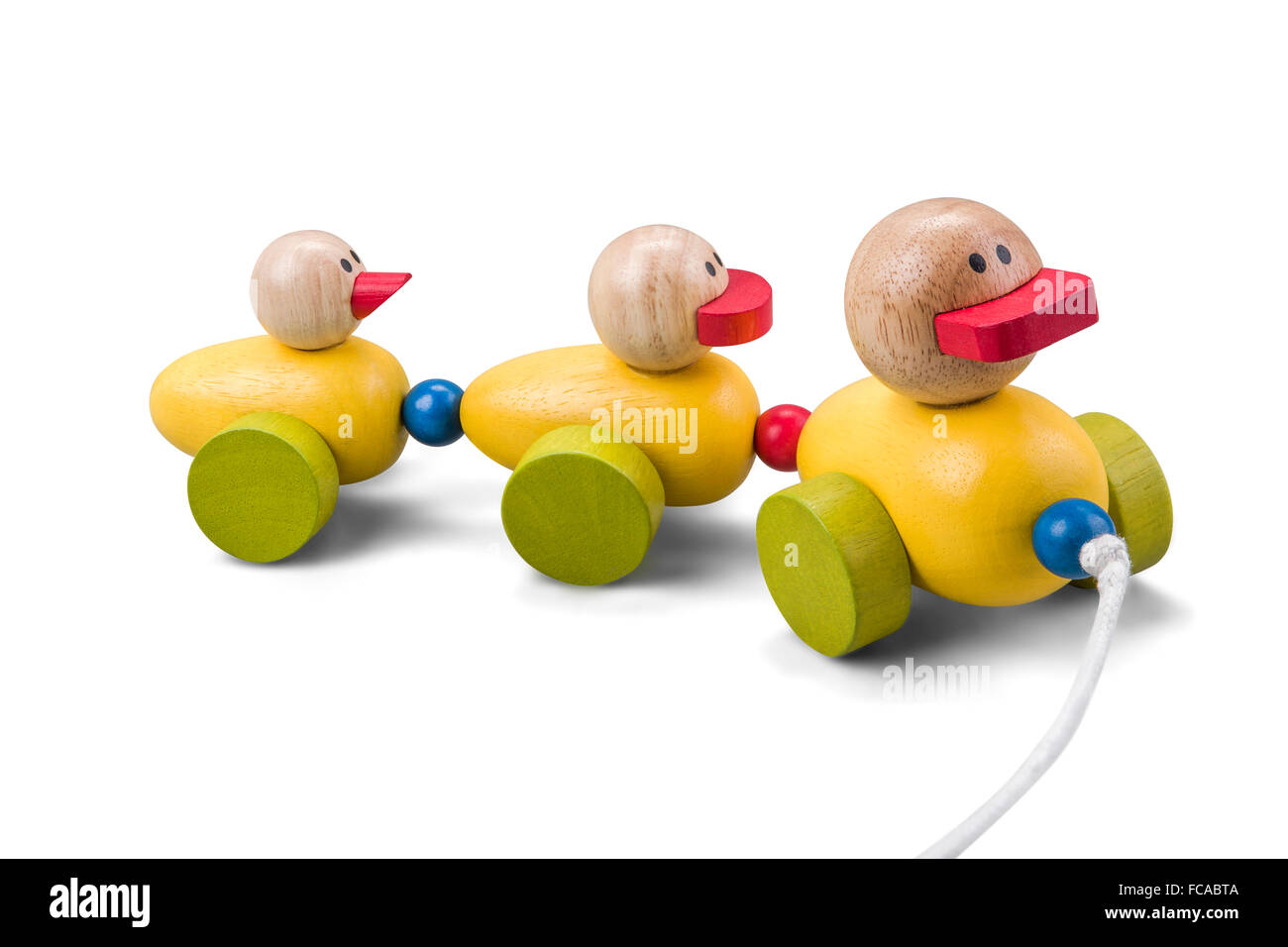 Wooden duck toy family train with colorful parts isolated over white with clipping path Stock Photo