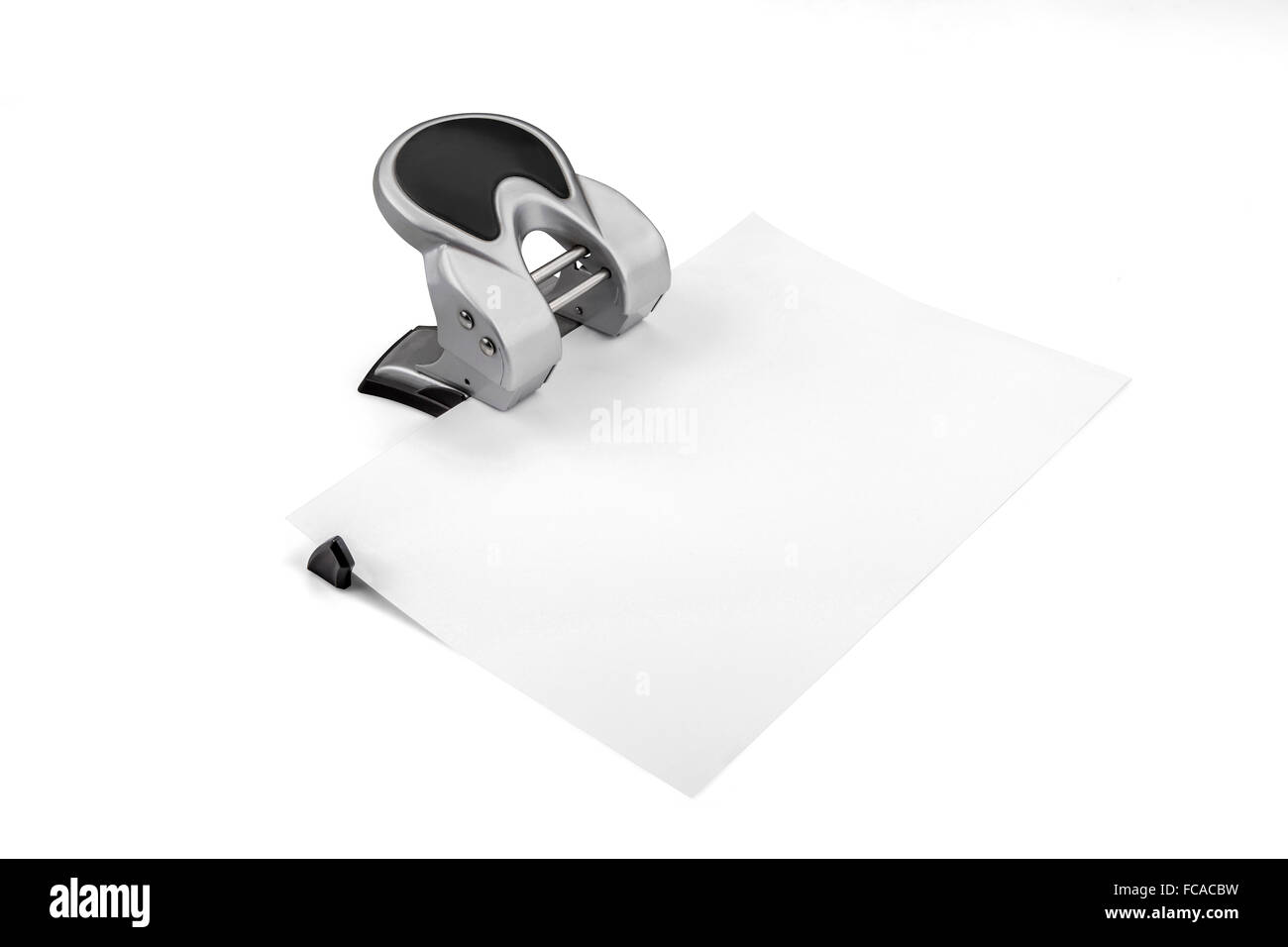 Office paper perforator isolated on white with clipping path Stock Photo