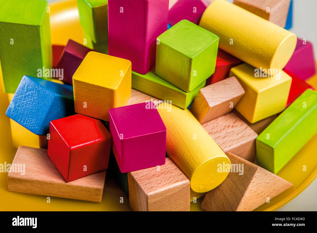 Untidy variety wooden colorful blocks Stock Photo