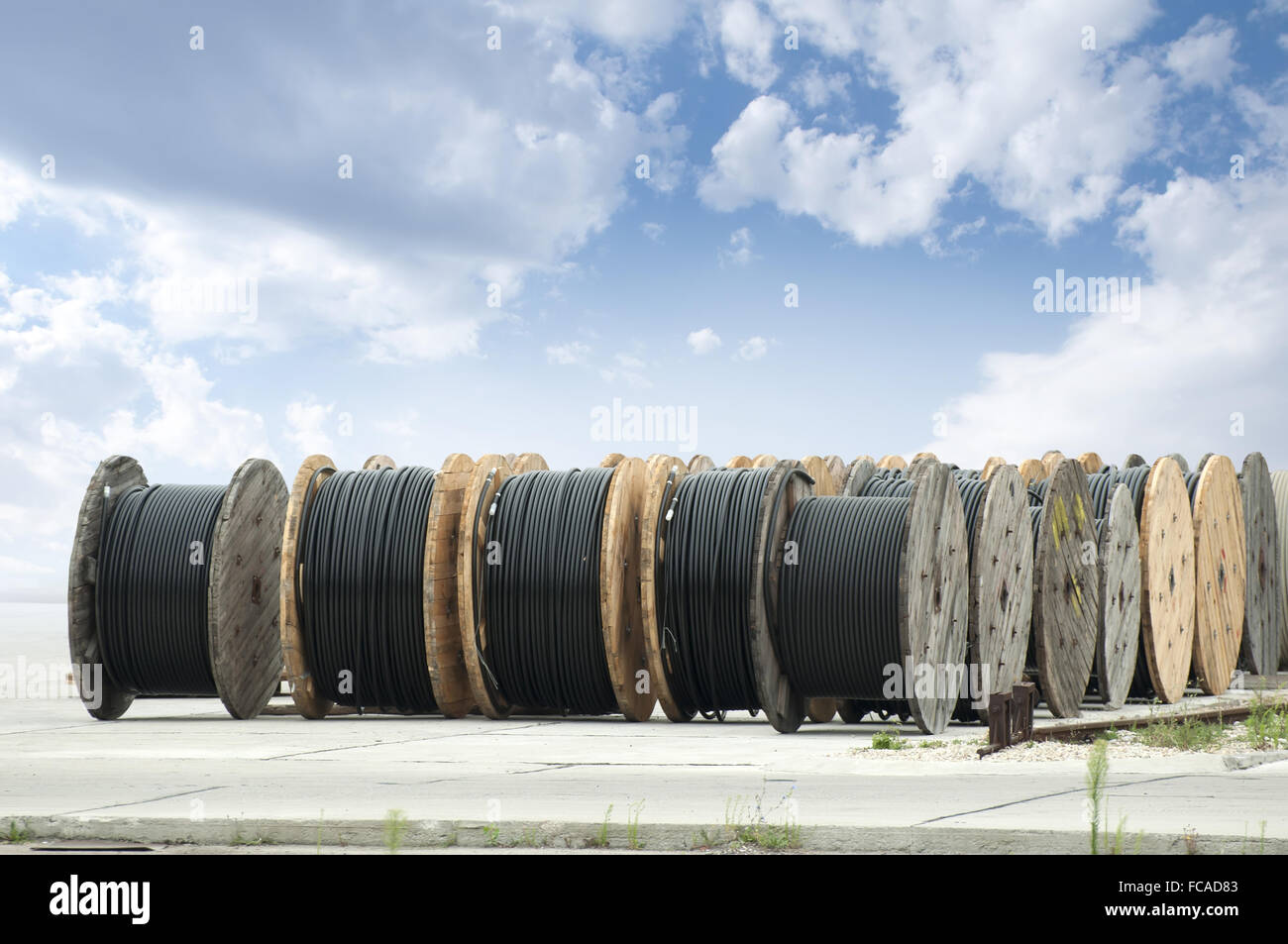 Large rolls of black cables Stock Photo - Alamy