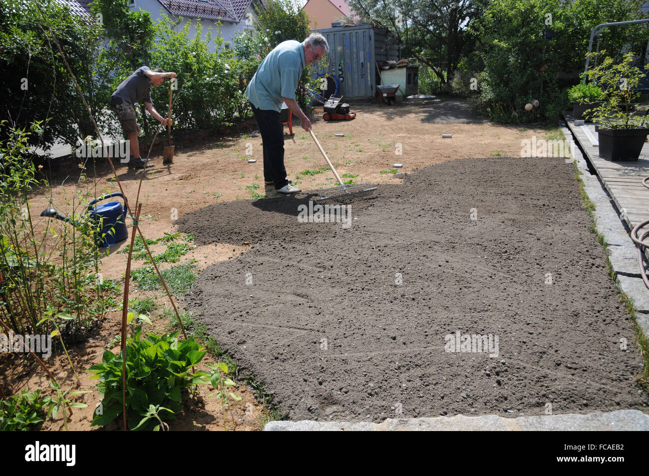 Laying sod, preparing soil Stock Photo