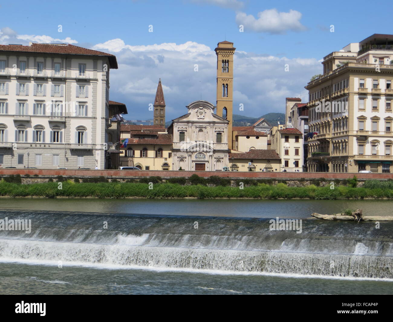 The weir over the River Arno in Florence, looking into the city. Stock Photo