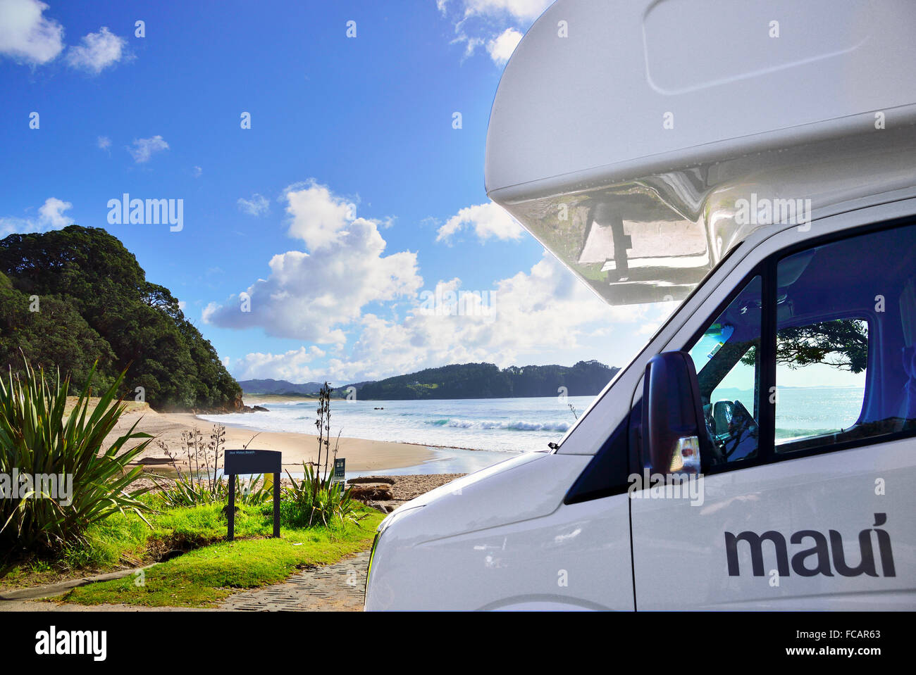 Motorhome parked at Hot Water Beach where hot water thermal springs surface and at low tide  are able to make your own hot pool. Stock Photo