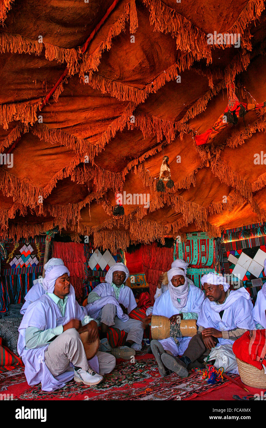 Men playing music in TAFSIT festival. Algeria, Sahara, Hoggar (Ahaggar