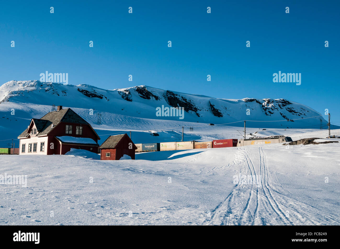 Freight train at  Finse, Hardangervidda plateau , winter, Hordaland, Norway Stock Photo
