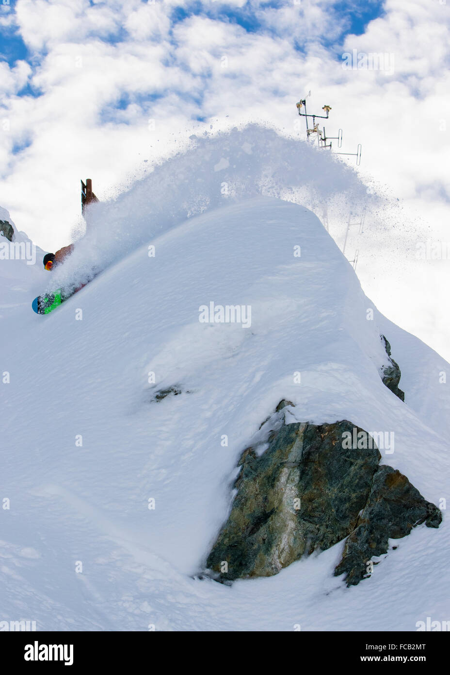 Snowboarder Slashing Powder Stock Photo