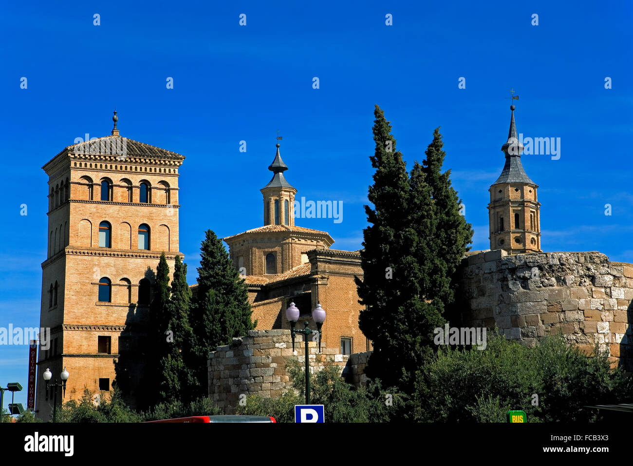 Zaragoza, Aragón, Spain: Roman walls with  tower of the Zuda and Church of San Juan de los Panetes Stock Photo