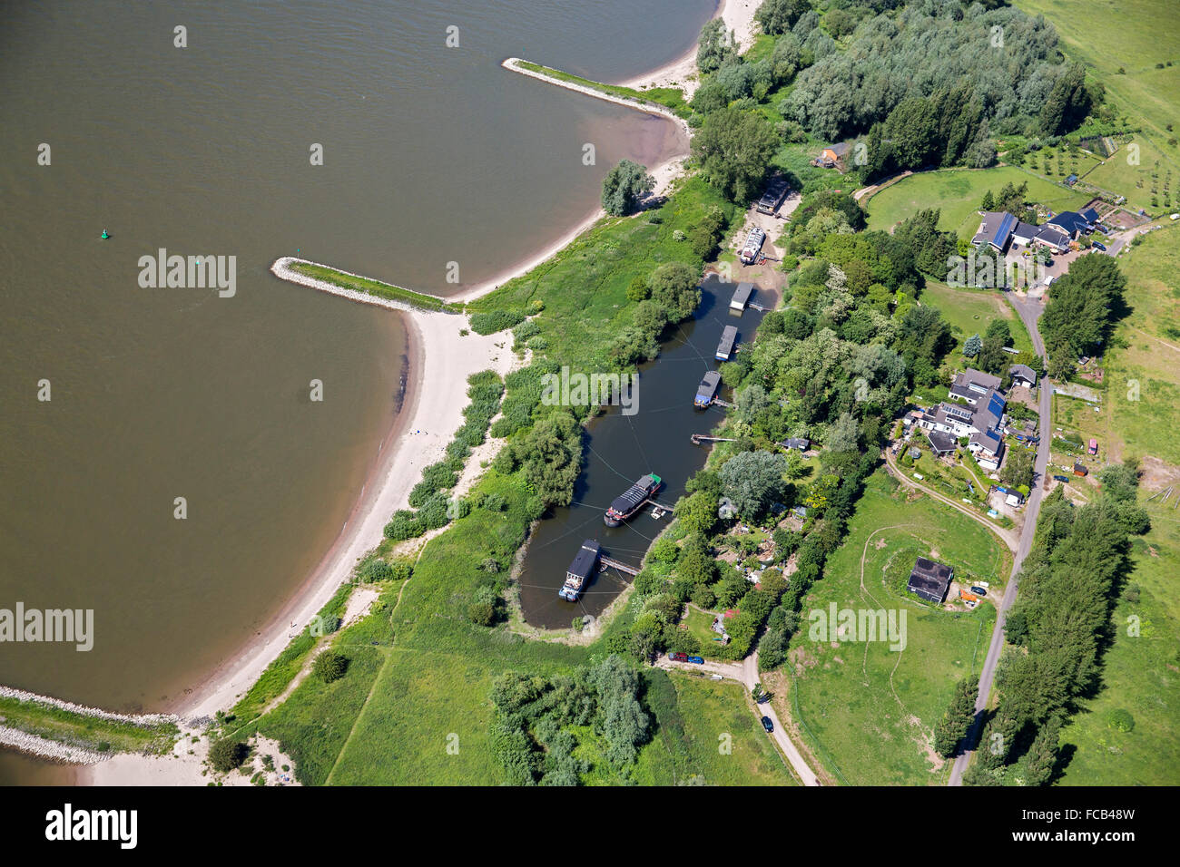 Netherlands, Ooij, Houseboats near Waal river, aerial Stock Photo