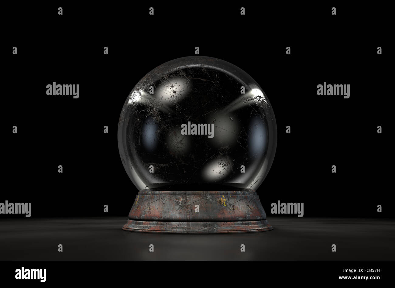 A regular crystal ball on an isolated dark studio background Stock Photo