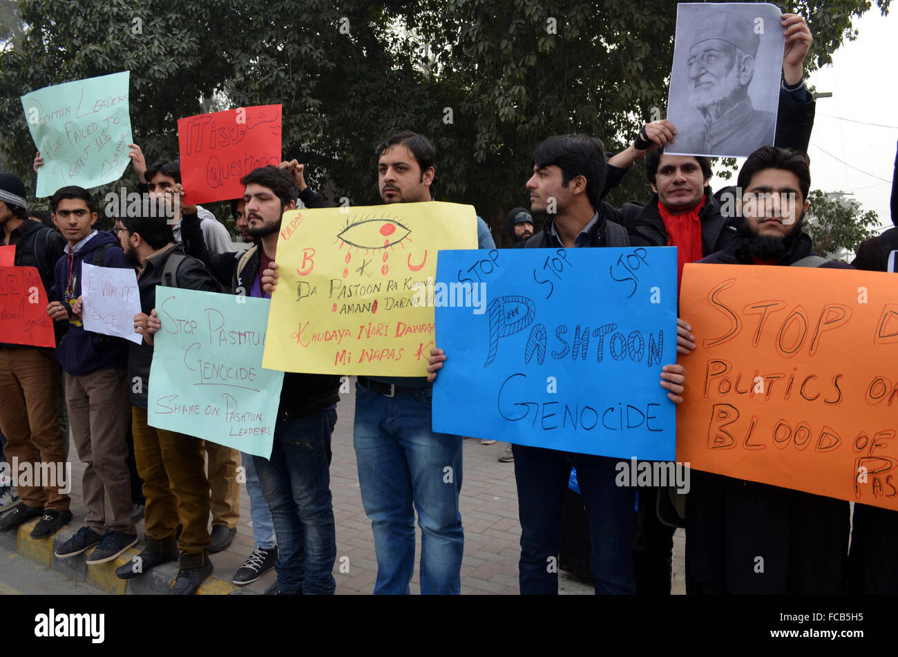 Lahore. 21st Jan, 2016. Pakistani students hold placards as they protest against the militants attack on Bacha Khan University, in eastern Pakistan's Lahore on Jan. 21, 2016. Officials said death toll from the deadly attack on Bacha Khan University in Charsadda district has reached 21. Credit:  Jamil Ahmed/Xinhua/Alamy Live News Stock Photo