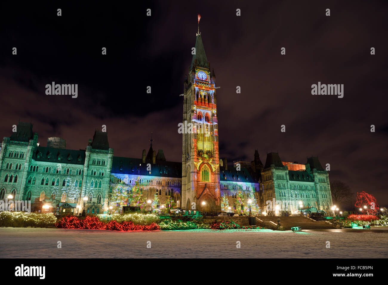 Christmas Light Show at Canadian Parliament Buildings Center Block at Parliament Hill Ottawa Canada in winter at night Stock Photo