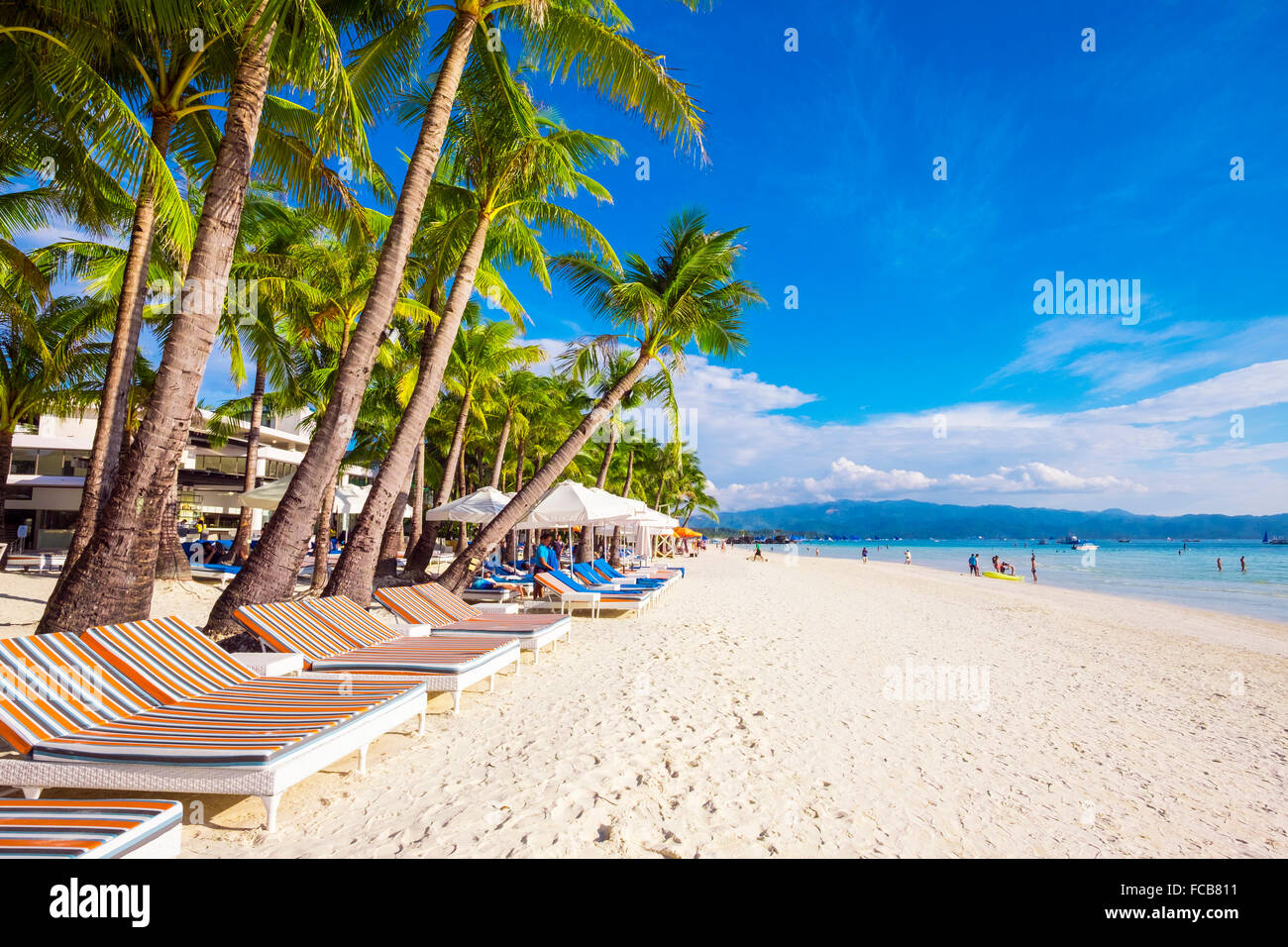 Beach lounge chairs on on White Beach, Boracay, Philippines Stock Photo