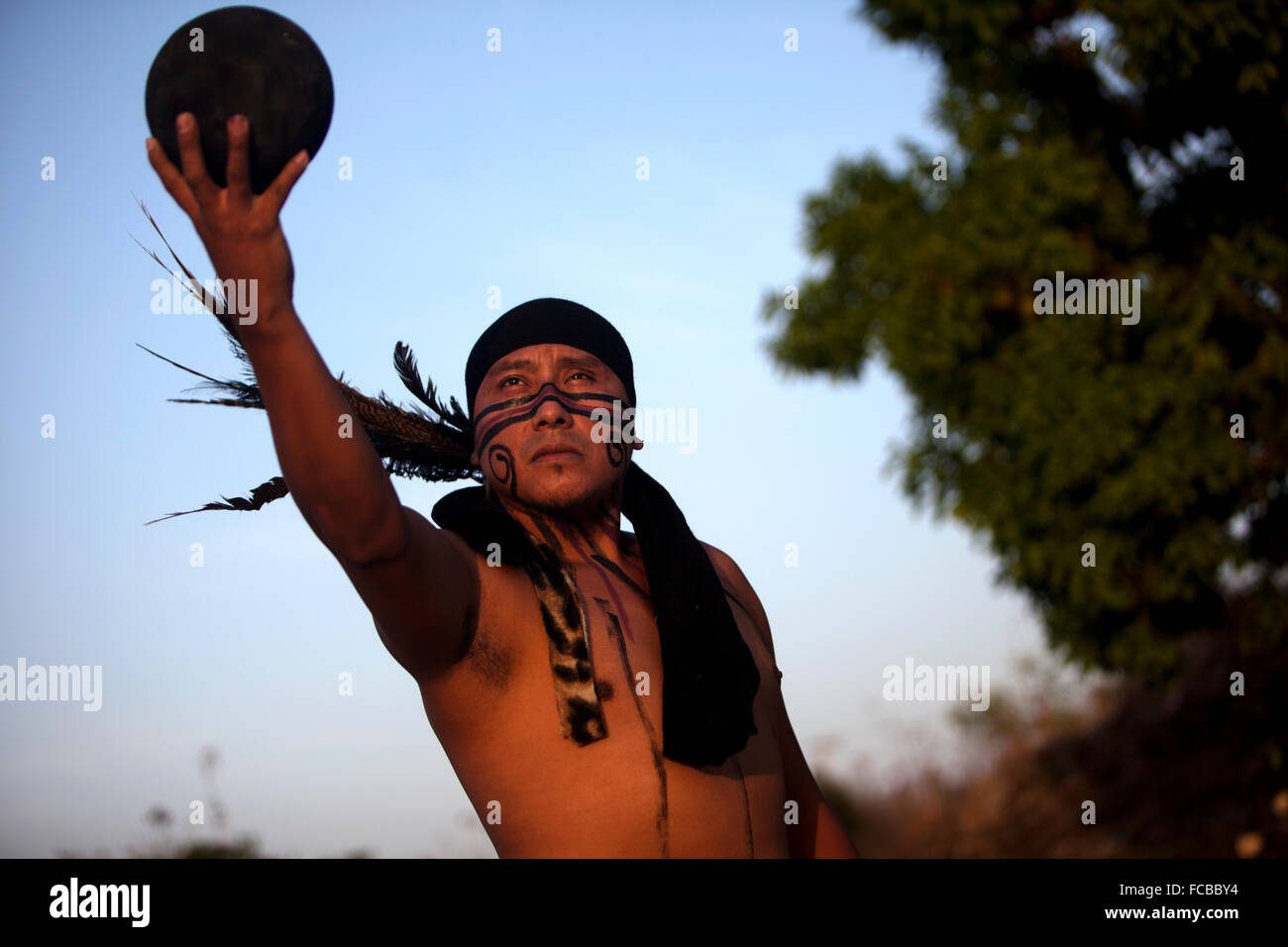 A player of Mayan Ball Game or ®Pok Ta Pok®, holds the ball as he poses in Chapab de las Flores, Yucatan, Mexico Stock Photo