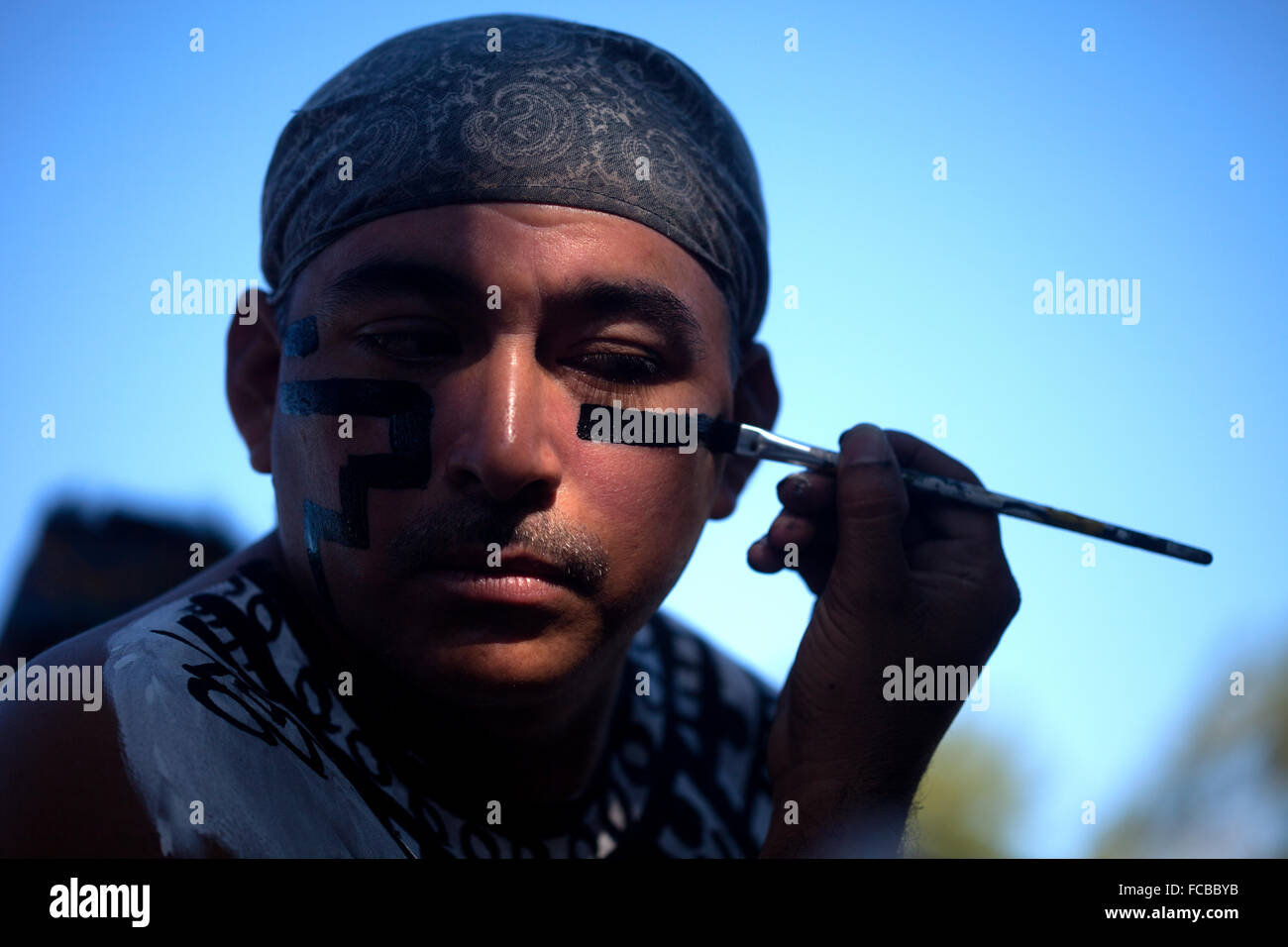 A Mayan Ball Player from Chapab team from Mexico paints his face during the first ®Pok Ta Pok® World Cup in Piste, Tinum, Stock Photo