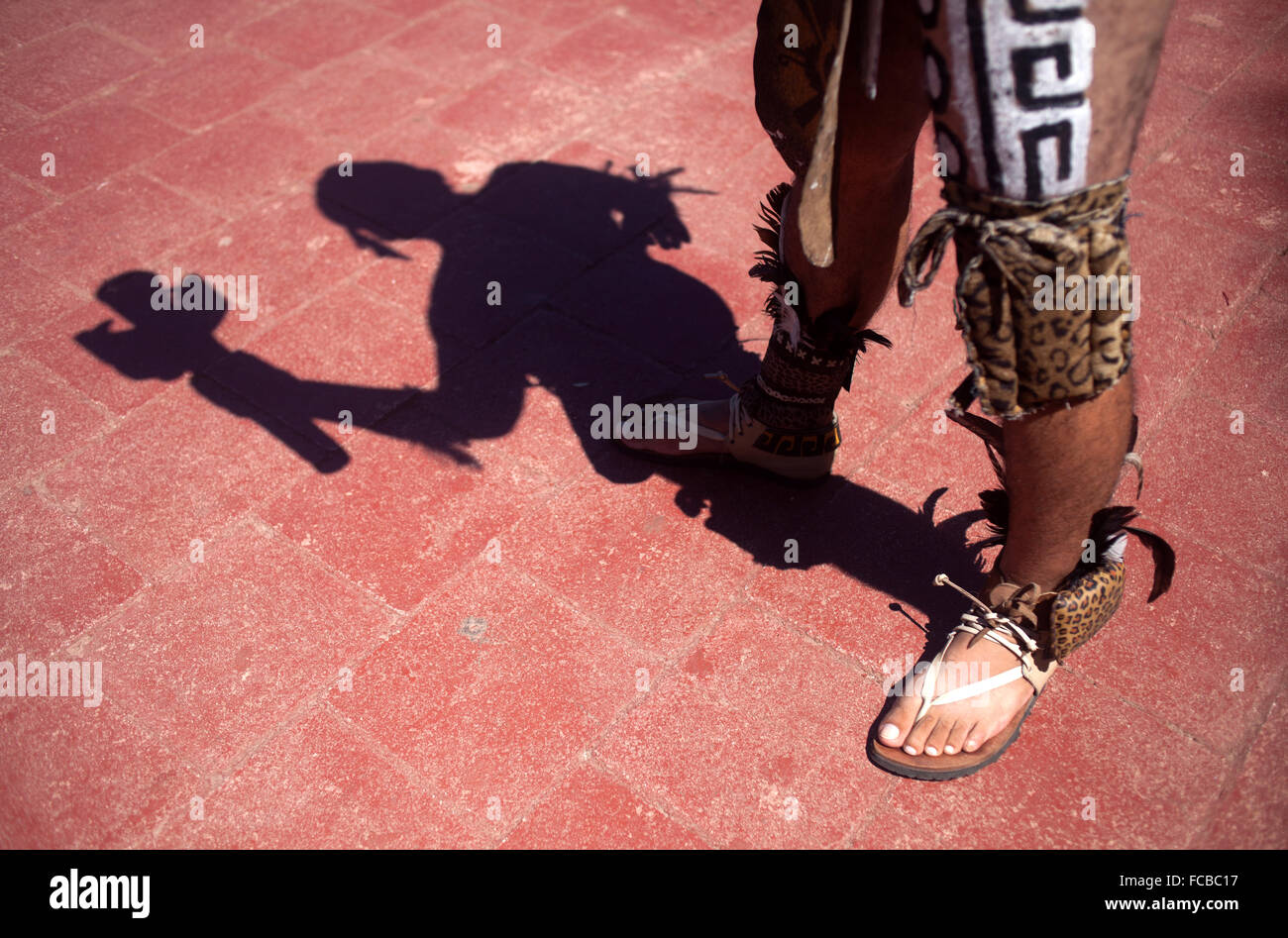 A Mayan Ball Player holds a torch during the first ®Pok Ta Pok® World Cup in Piste, Tinum, Yucatan, Mexico Stock Photo