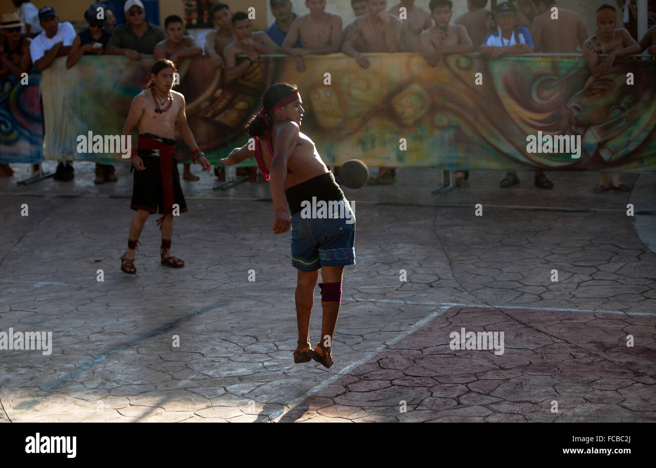 A Mayan Ball Player from Guatemala hits the ball with his hip during the first ®Pok Ta Pok® World Cup in Piste, Tinum, Yucatan, Stock Photo