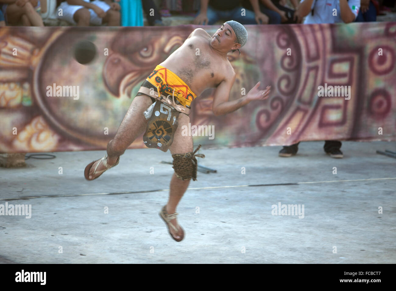 A Mayan Ball Player from Chapab de las Flores team hits the ball with his hip during the first ®Pok Ta Pok® World Cup in Piste, Stock Photo