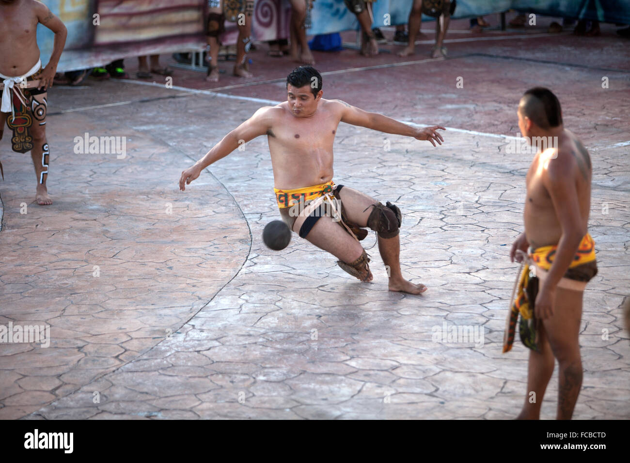 A Mayan Ball Player from Chapab de las Flores team hits the ball with his hip during the first ®Pok Ta Pok® World Cup in Piste, Stock Photo