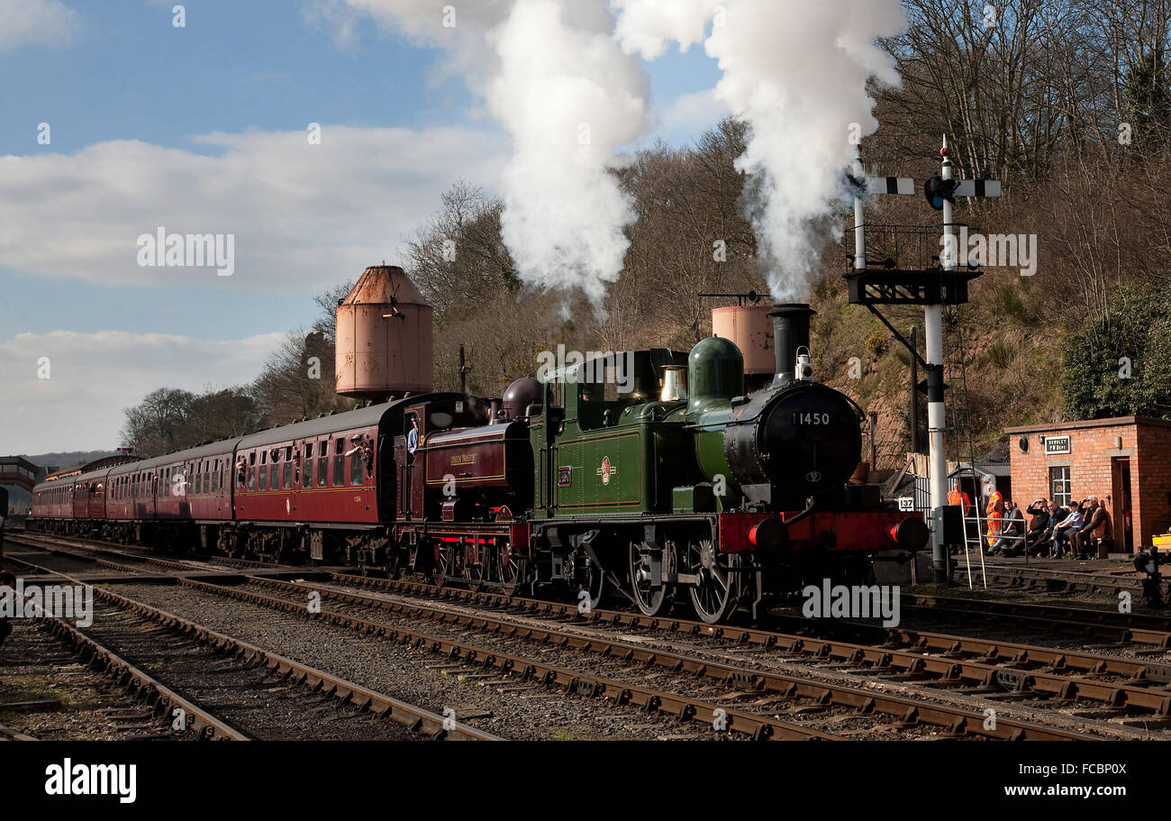 BR 0-4-2T '14xx' No. 1450 and LT 0-6-0PT '57xx' No.. L92 depart Bewdley station on the Severn Valley Railway during their Spring Stock Photo