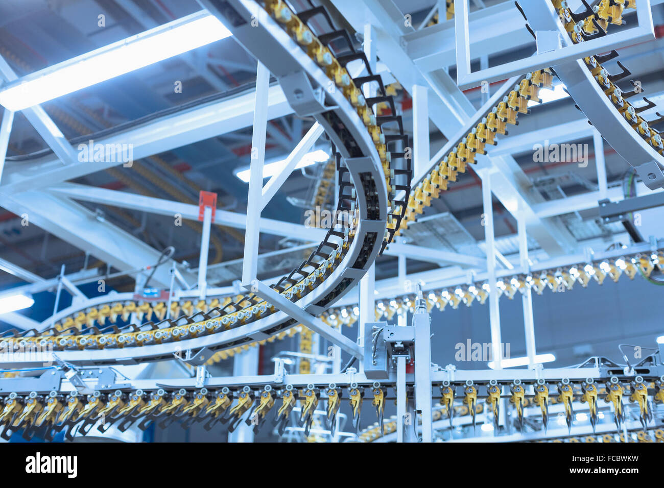 Winding printing press conveyor belts overhead Stock Photo