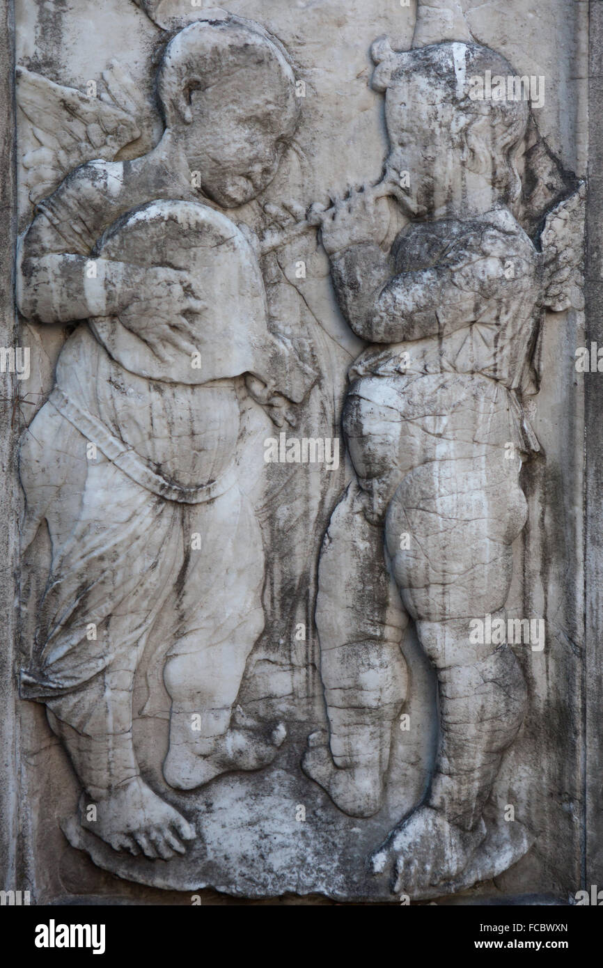 Renaissance musicians playing flute and lute. Marble relief by Italian Renaissance sculptor Giovanni Antonio Amadeo on the Cappella Colleoni in Bergamo, Lombardy, Italy. Stock Photo