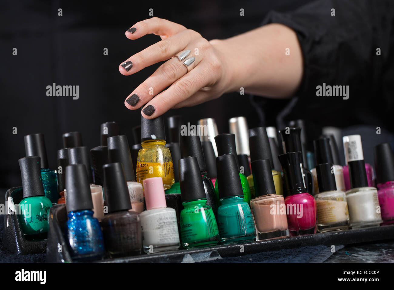Cosmetology class. Picking out fingernail polish. Stock Photo