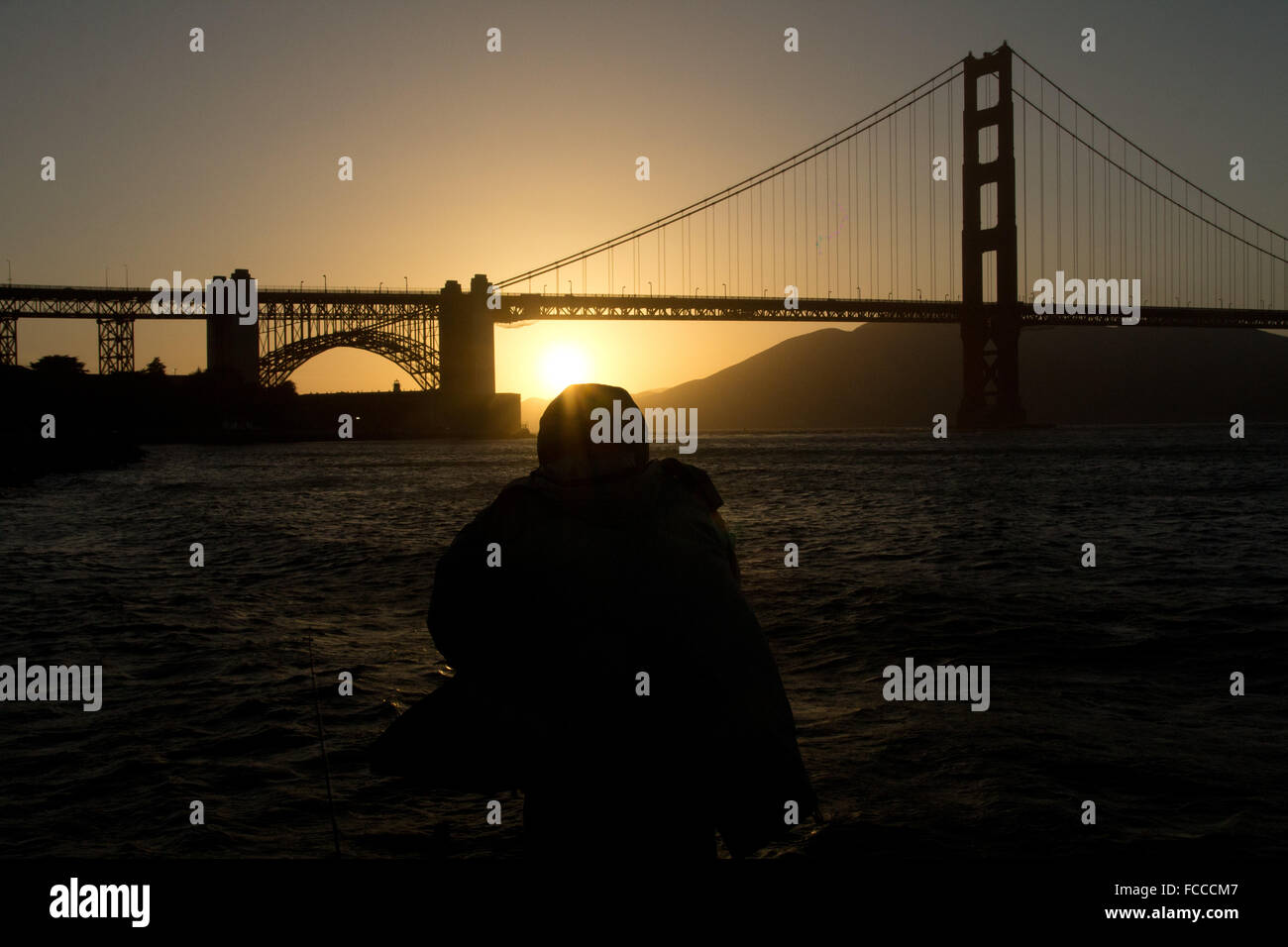 Bridge over water at sunset hi-res stock photography and images - Alamy
