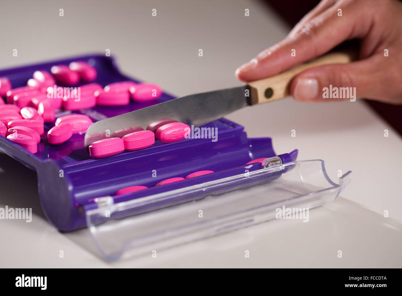 Counting medicine at Pharmacy Stock Photo - Alamy