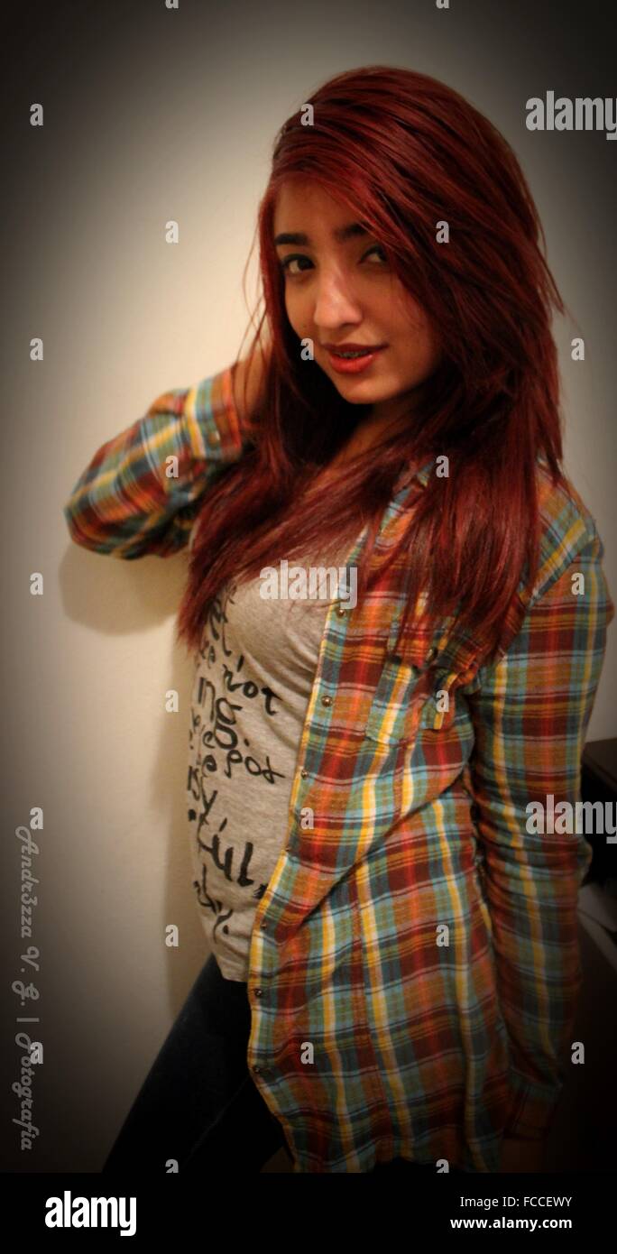 Portrait Of Young Woman Posing In House Stock Photo - Alamy