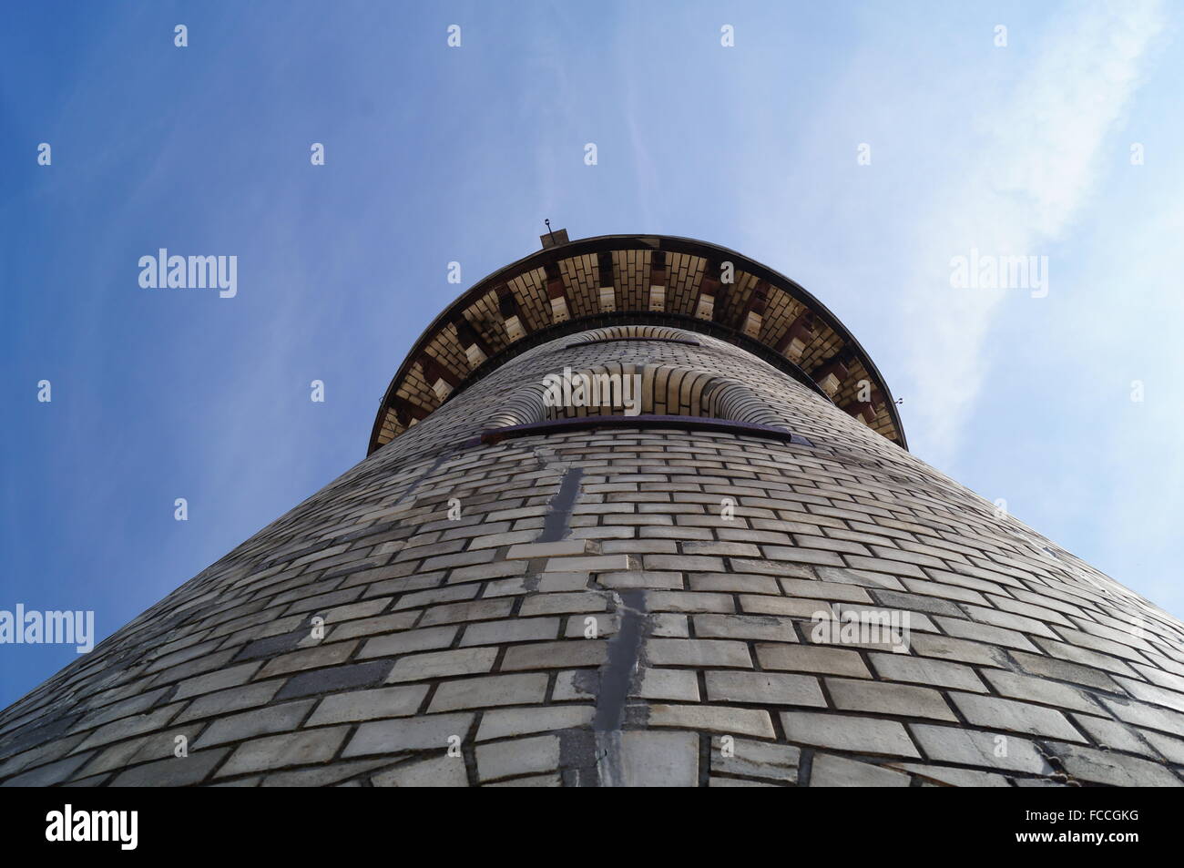 Low Angle View Of Tower Against Blue Sky Stock Photo