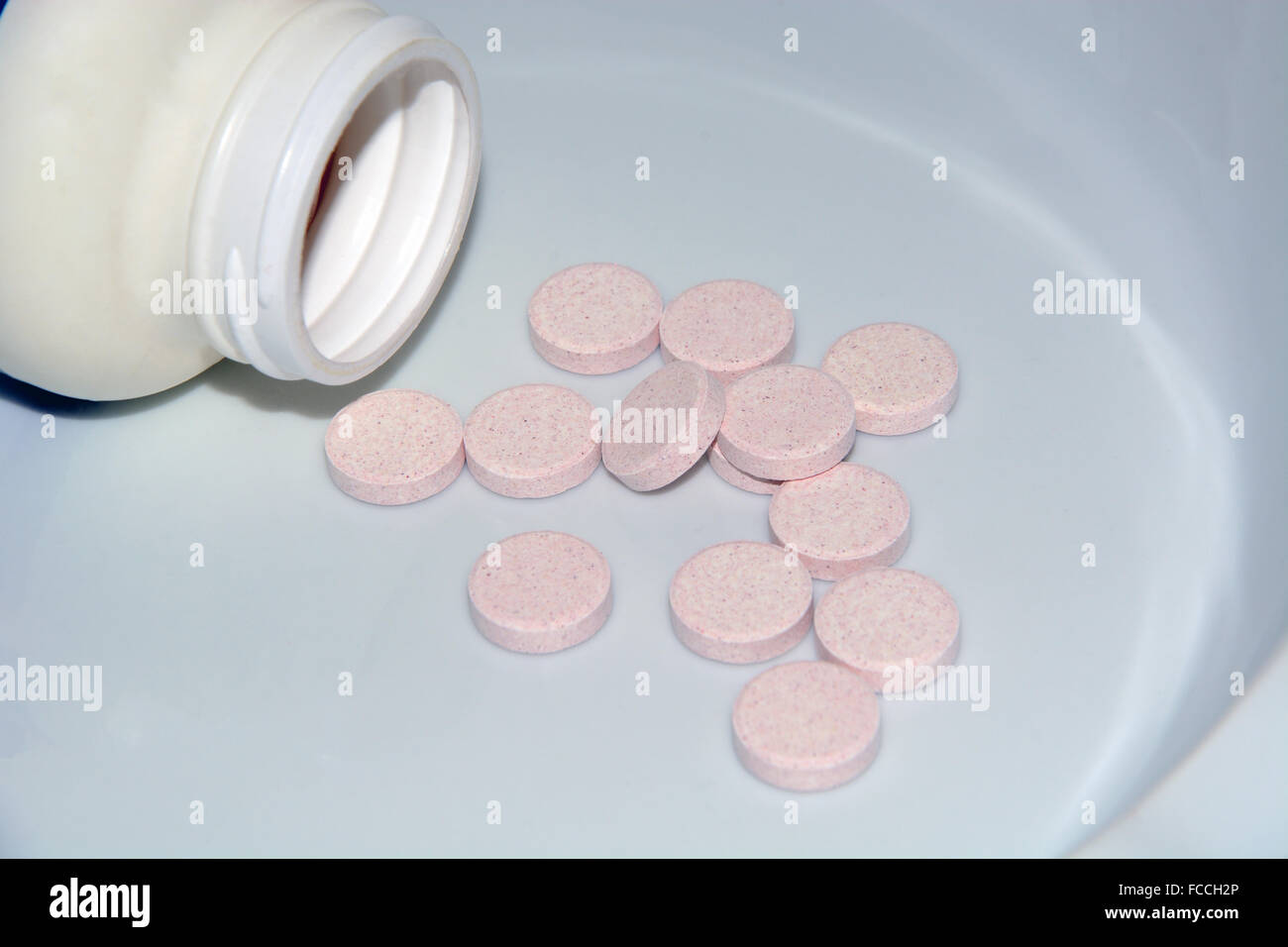Lactobacillus acidophilus pills and bottle on plate Stock Photo - Alamy