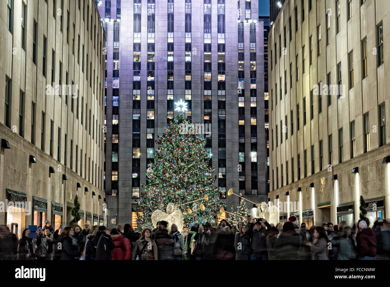 Crowds Gathered at Rockefeller Center Plaza, Fifth Avenue, Manhattan, New York City, Admiring the Holiday Decorations and Christ Stock Photo