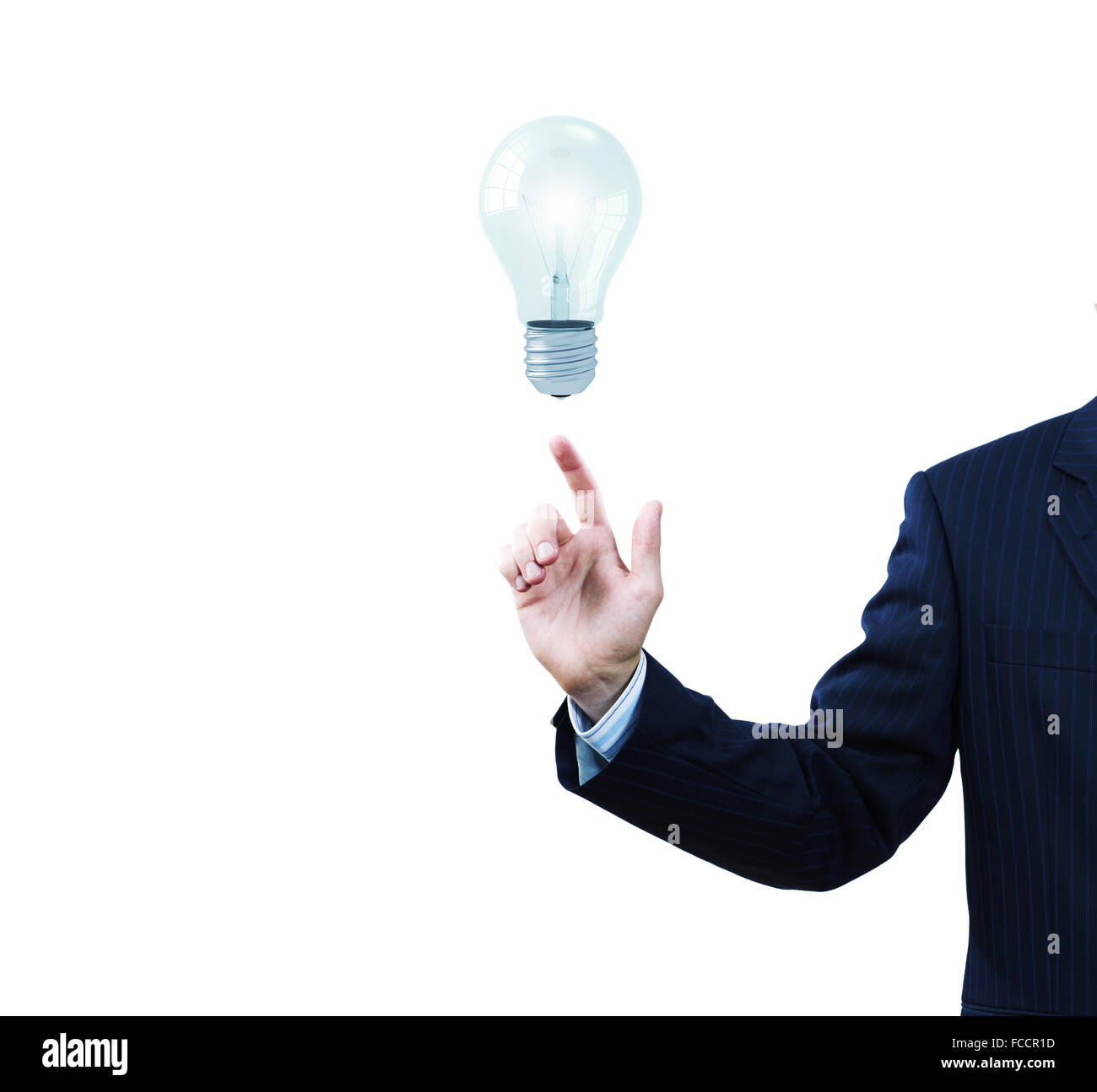 Businessman pointing at electric bulb with finger Stock Photo - Alamy