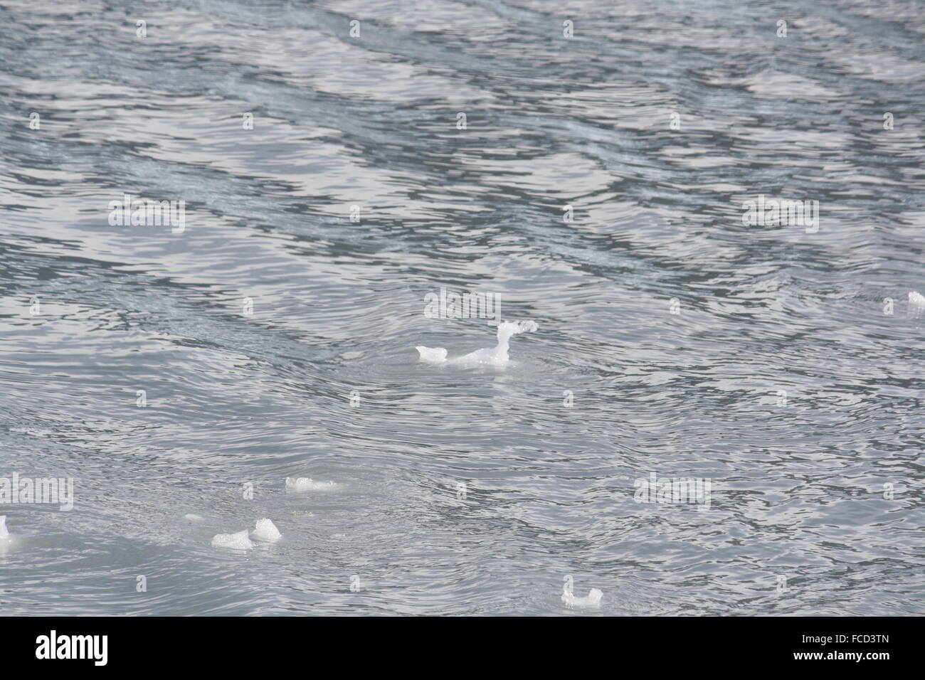 High Angle Close Up Of Ice Melting On The Sea Stock Photo